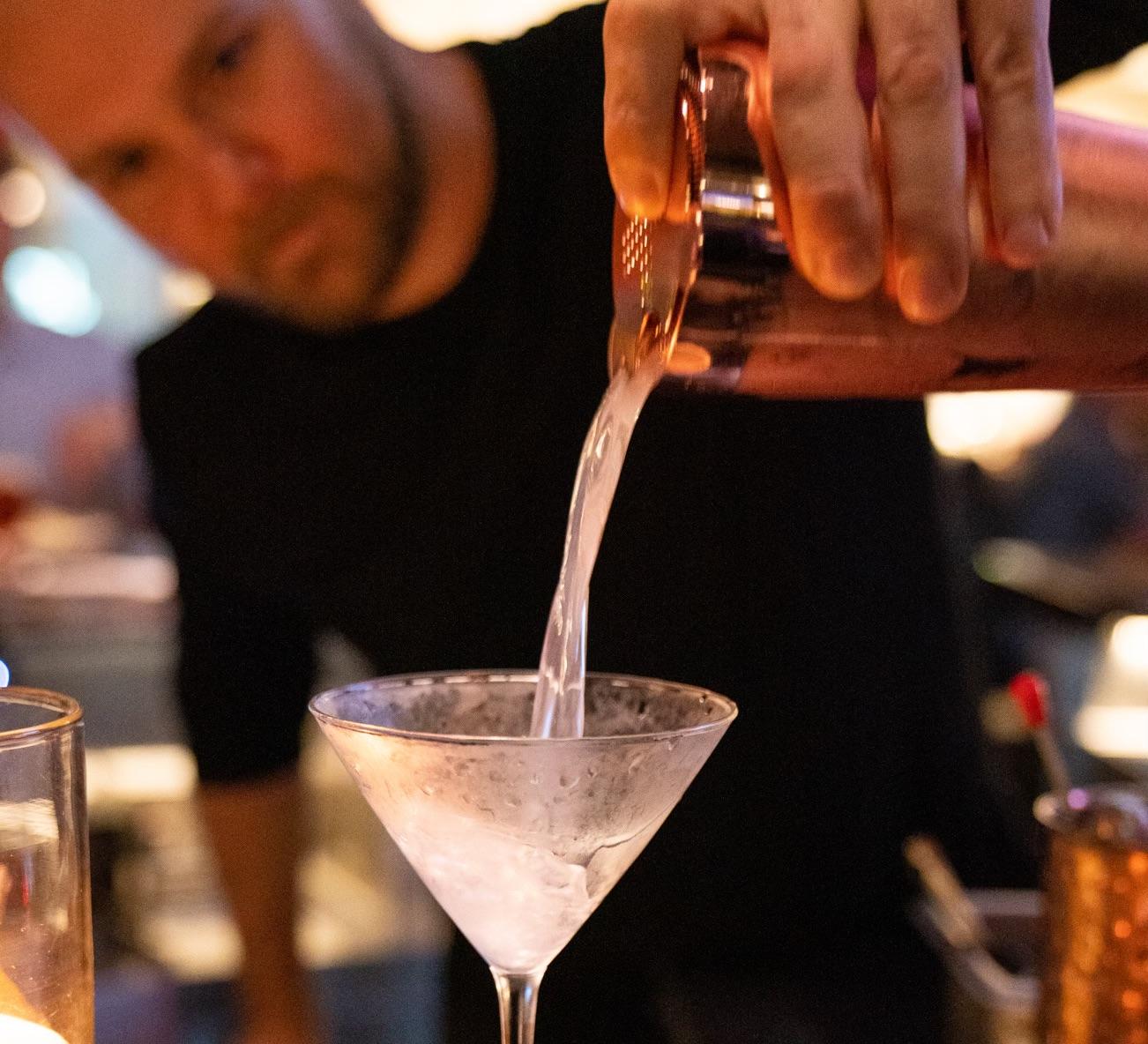 Bartender pouring a drink